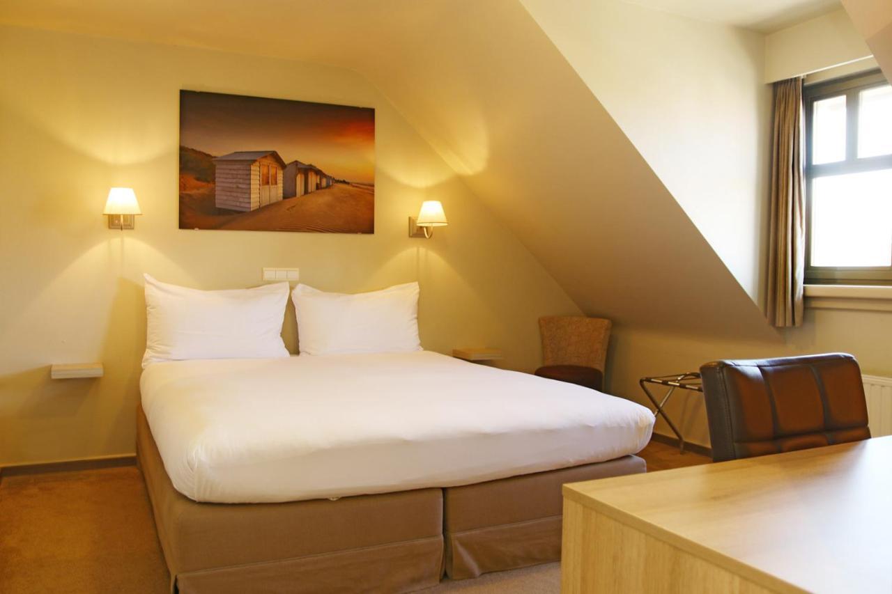 Hotel Les Dunes De Haan Bagian luar foto